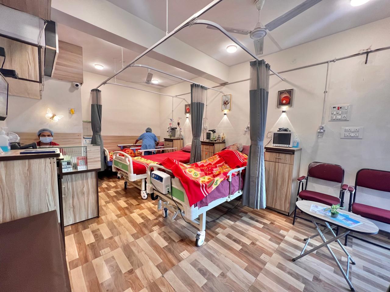 Trained nursing staff attending to patients in the ward